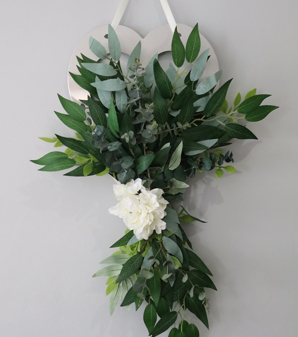 Metal Heart decorated with green foliage