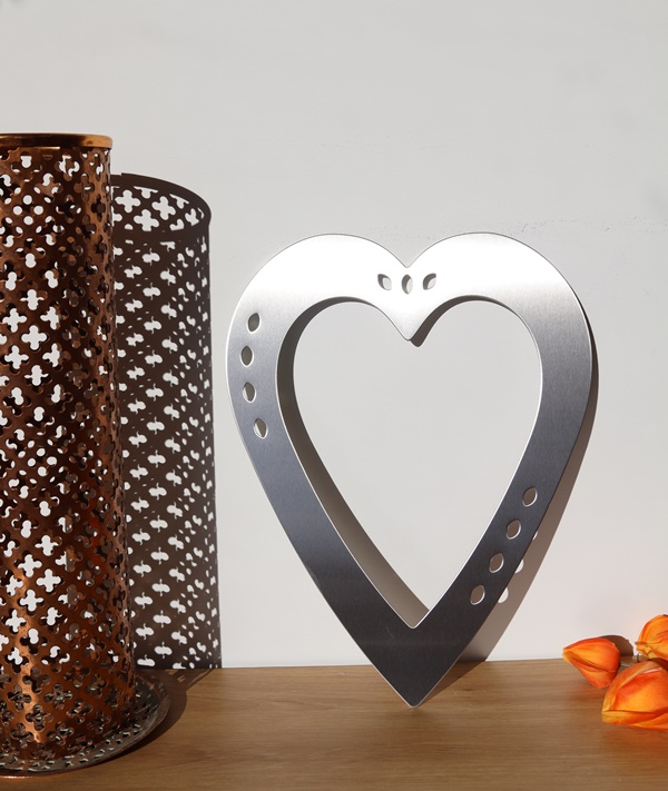 Stainless Steel Heart against wall