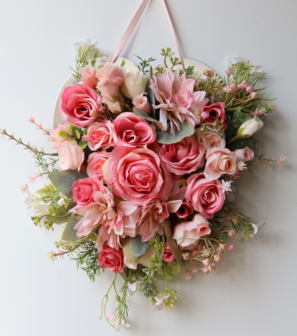 Stainlees Steel Heart with beautiful floral arrangement